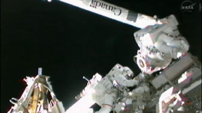 spacewalk-hoshide-robotic-arm