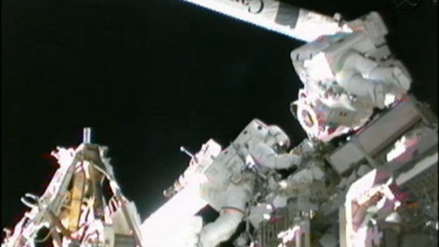 spacewalk-hoshide-robotic-arm