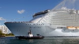 Royal Caribbean reported a stronger fourth-quarter profit that topped expectations, but warned the Costa Concordia wreck could weigh on earnings in .