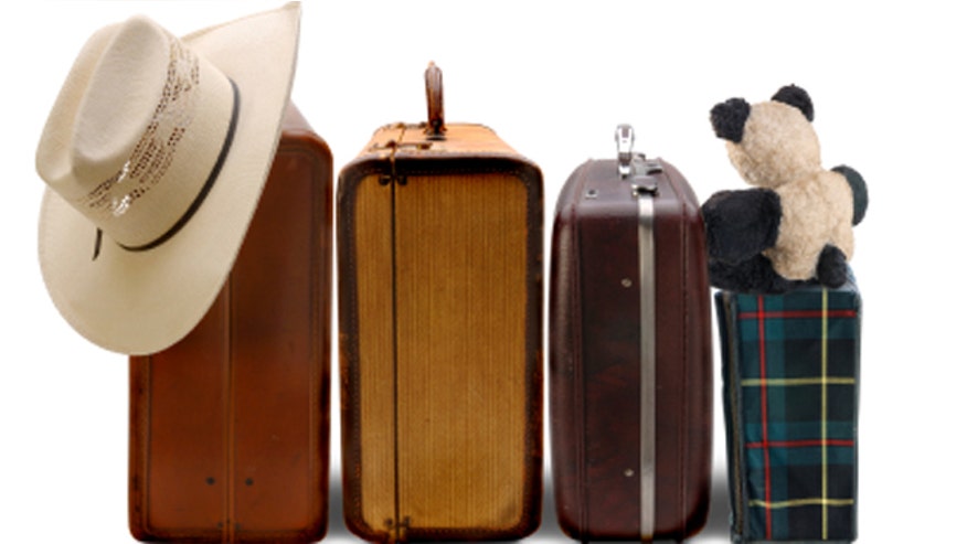 istocksuitcasesfamilytravel.jpg