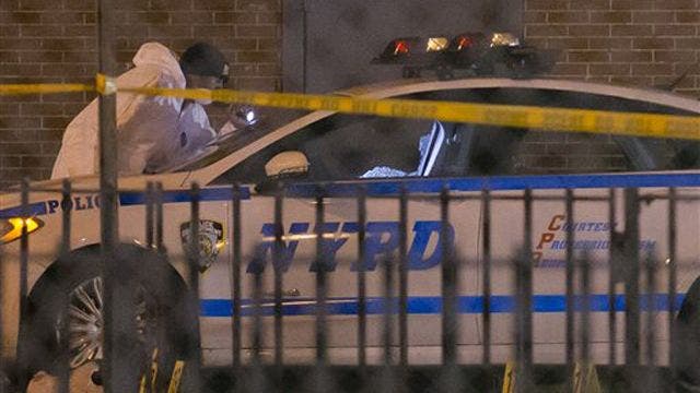 122014_anhq_copsdead_640.jpg