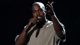 Kanye West rants on Twitter about bad review, other artists