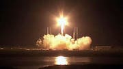 A first-of-its-kind commercial supply ship rocketed toward the International Space Station following a successful liftoff early Tuesday, opening a new era of dollar-driven spaceflight.
