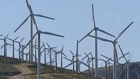 New research finds that wind farms actually warm up the surface of the land underneath them during the night, a phenomenon that could put a damper on efforts to expand wind energy as a green energy solution.