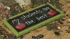 Students from a suburban Oklahoma City elementary school destroyed by this week's tornado reunited with their teachers Thursday and collected whatever could be salvaged from the ruins.