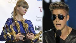 Taylor Swift is red hot.The singer, who is nominated for  Billboard Music Awards, was the show's early leader with six wins, including top country artist, country song for We Are Never Getting Back Together and country album for Red. She topped it off with a colorful performance of her hit  — starting backstage and working her way to the main stage on the back of a bike with help from a dozen background dancers and a flurry of red balloons.