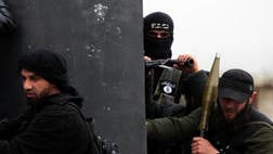 >Hundreds of jihadist fighters from the Al-Qaeda-affiliated Islamic State of Iraq and the Levant (ISIL) have advanced in northern Syria towards a border post with Turkey, an NGO said Wednesday.