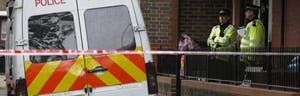 The wife of the British soldier hacked to death in an apparent terror attack told reporters Friday she will miss him terribly, as police identified the second suspect being held in connection with the murder.
