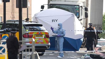 Counterterrorism police are questioning a friend of Michael Adebolajo, one of two men suspected of the savage killing of a British soldier.