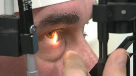 A blind man given a bionic eye implant that gives him rudimentary vision became the first British patient to be fitted with a digital chip similar to those used in mobile phone cameras.