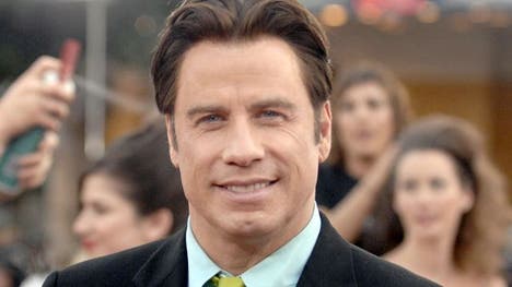 A hotel masseur claimed he had a steamy romp with John Travolta.