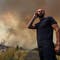 Strong winds fan growing Oregon fire as blazes rage across West
