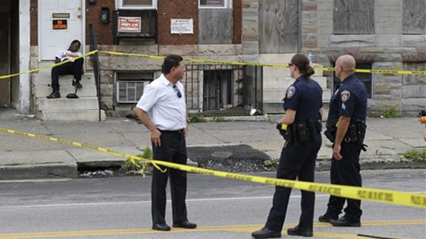 SKY-ROCKETING RATE Baltimore killings soar to a level unseen in 43 years