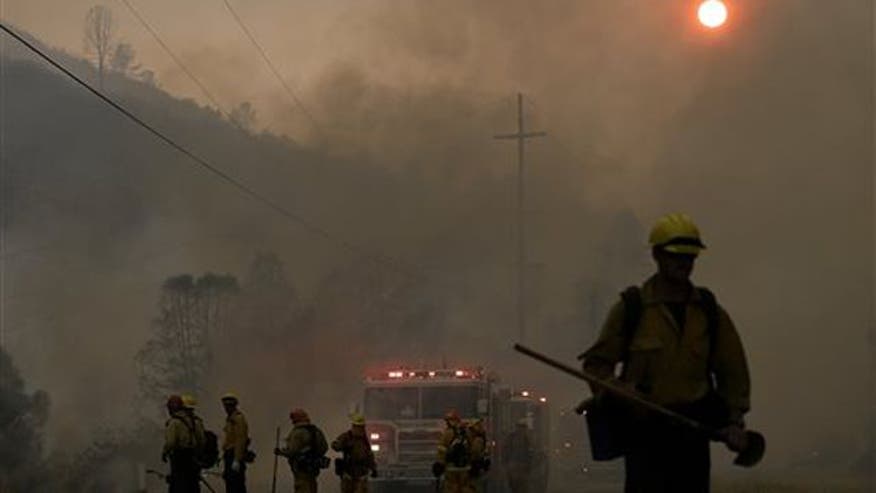 More than 20 wildfires burn in California forcing hundreds to flee