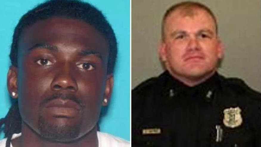 Suspect in killing of Memphis police officer charged with murder, held on $9M bail - Police dash-cam video debunks professor's claims - VIDEO: Suspect accused of killing Memphis cop turns himself in