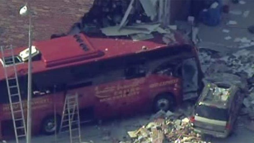 Multiple injuries reported after bus crashes into NYC building - VIDEO: Bus crashes into building in Queens