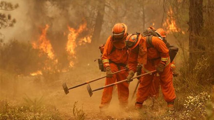 OUT-OF-CONTROL INFERNO: Calif. blaze destroys more than 100 homes