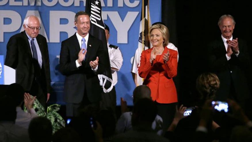 Defiant Clinton defends flip-flops, downplays email scandal at debate