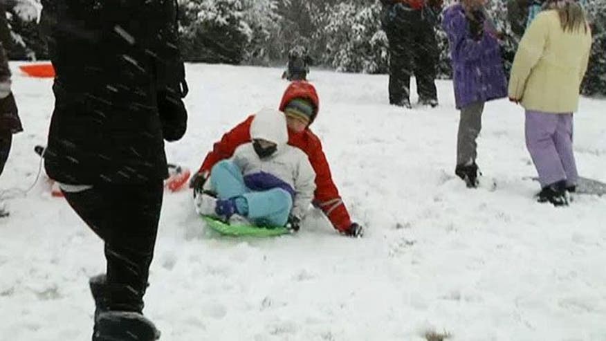 Land of Decree and Home of the Slave: Sledders defy poLICE with 'sled-in' protest on Capitol Hill Sr_grapevine_030515
