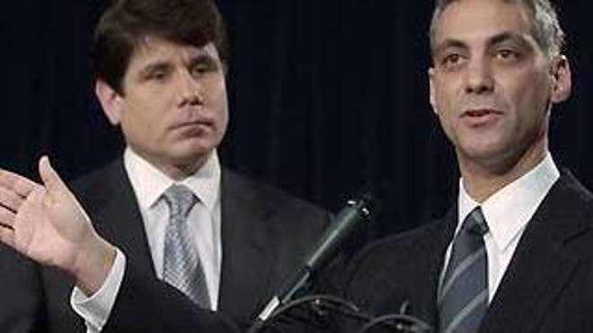 File: In this Dec. 22, 2003, photo Rep. Rahm Emanuel answers a question as Ill. Gov. Rod Blagojevich listens during a news conference in Chicago (AP Photo).
