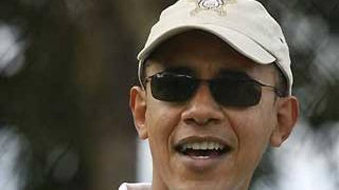 President-elect Barack Obama arrives to play golf in Kailua, Hawaii Sunday, Dec. 21, 2008. (AP Photo/Gerald Herbert)