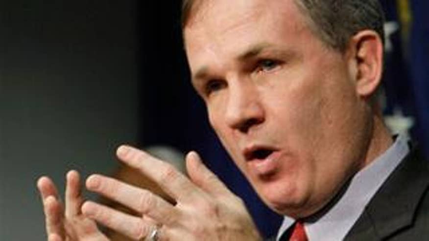 Dec. 9: U.S. Attorney Patrick Fitzgerald talks about the criminal complaint against Illinois Gov. Rod Blagojevich on corruption charges during a news conference in Chicago. (AP photo)