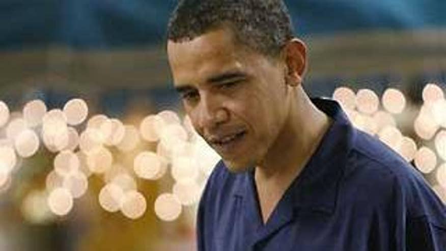 President-elect Barack Obama greets soldiers as they eat Christmas dinner at Marine Corp Base Hawaii in Kailua, Hawaii Thursday, Dec. 25, 2008. (AP Photo/Gerald Herbert)