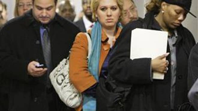 The Unemployed Line Up for a Job Fair