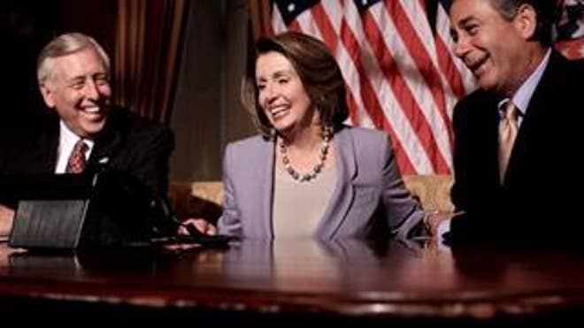 Nancy Pelosi shares a laugh as the 111th Congress opens session