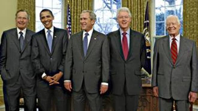 All living U.S. presidents pose with Barack Obama