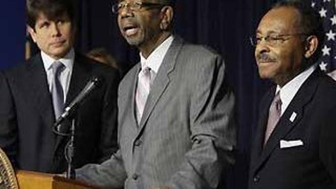In this Dec. 30, 2008 file photo, U.S. Rep. Bobby Rush D-Ill. speaks in Chicago after Illinois Gov. Rod Blagojevich, left, announced his choice of former Ill. Attorney General Roland Burris, right, to fill President-elect Barack Obama's U.S. Senate seat.