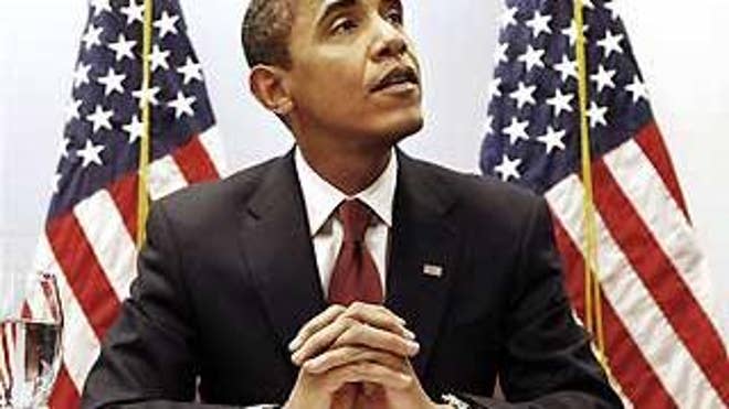 President-elect Barack Obama speaks to reporters after a meeting with his top economic advisers at his transition office in Washington, Tuesday, Jan. 6, 2009. (AP Photo/Gerald Herbert)