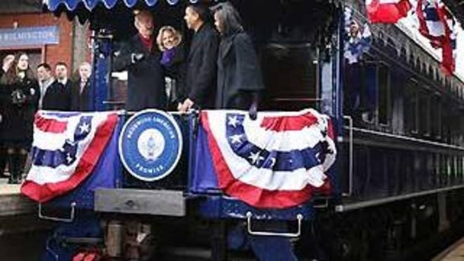 Jan. 17: The Obamas and Bidens took a train from Philadelphia to Washington, D.C., for the inauguration (AP Photo).