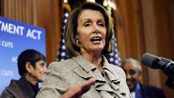 House Speaker Nancy Pelosi gestures during a news conference on stimulus legislation Wednesday on Capitol Hill. (AP Photo)