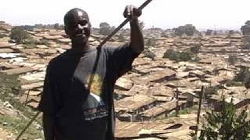 Nick Otieno, a 27-year-old Kenyan who lives without running water or electricity in Nairobi's Kibera slum, hopes Obama can help develop the area. (Tiffany Wilson)