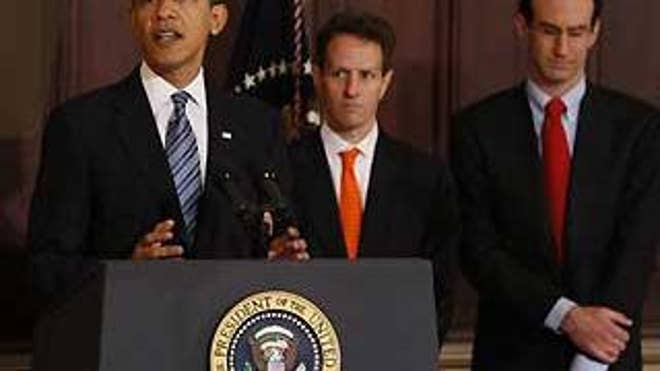 President Obama, accompanied by Budget Director Peter Orszag, right, and Treasury Secretary Tim Geithner, speaks about his fiscal 2010 budget Thursday in Washington. (AP Photo)