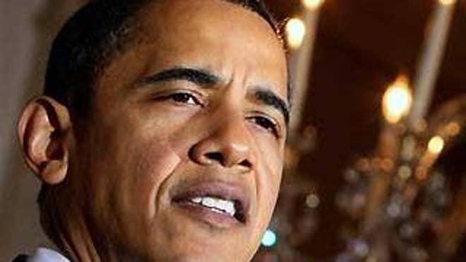 President Obama holds a press conference Tuesday in the Grand Foyer at the White House in Washington. (AP Photo)