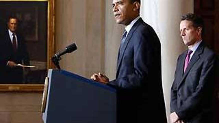 Feb. 4: President Obama makes remarks about limiting executive compensation while Treasury Sec. Tim Geithner stands by his side. (AP Photo)