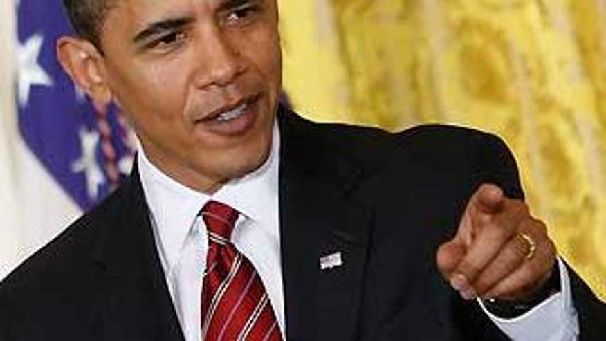 President Obama speaks before signing an executive order dealing with a middle-class task force at the White House on Friday. (AP Photo)