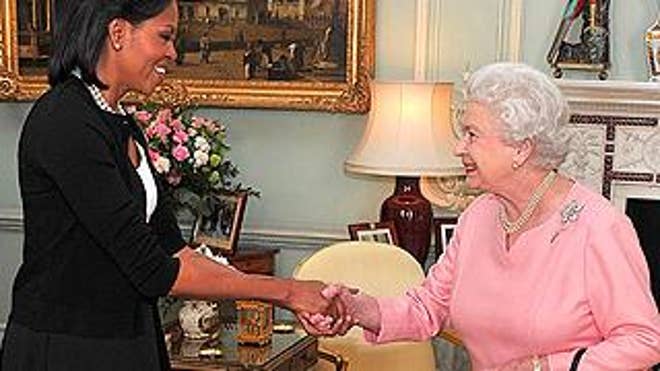 Apr. 1: First lady Michelle Obama is welcomed by Britain's Queen Elizabeth II, as she arrives with President Obama for an audience at Buckingham Palace in London. (AP)