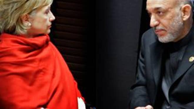 Hillary Clinton and Hamid Karzai