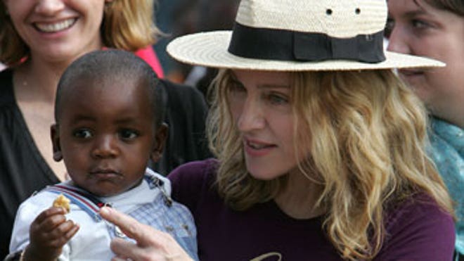 1_21_Madonna_Adoption1