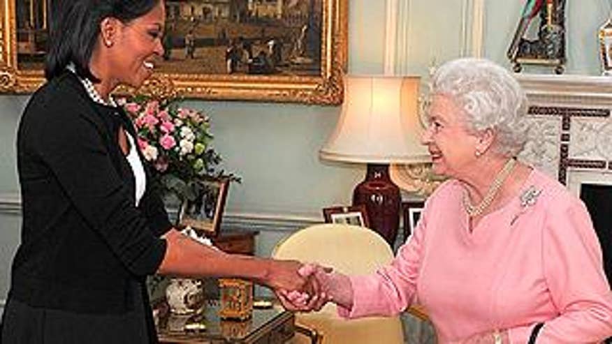 Apr. 1: First lady Michelle Obama is welcomed by Britain's Queen Elizabeth II, as she arrives with President Obama for an audience at Buckingham Palace in London. (AP)
