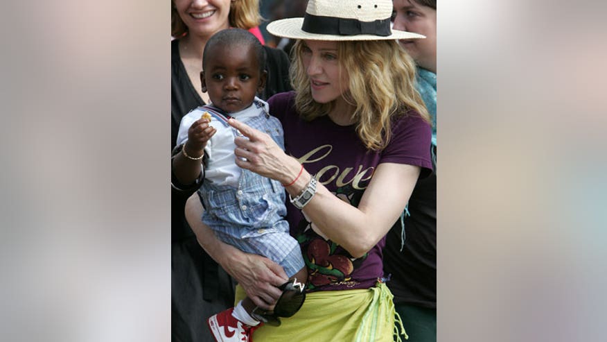 1_21_Madonna_Adoption1