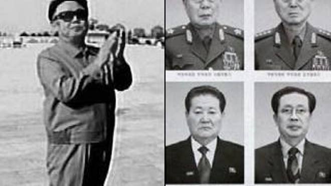 Kim Jong Il's regime recently released a poster, right, of "head shots" of top officials of the National Defense Commission.