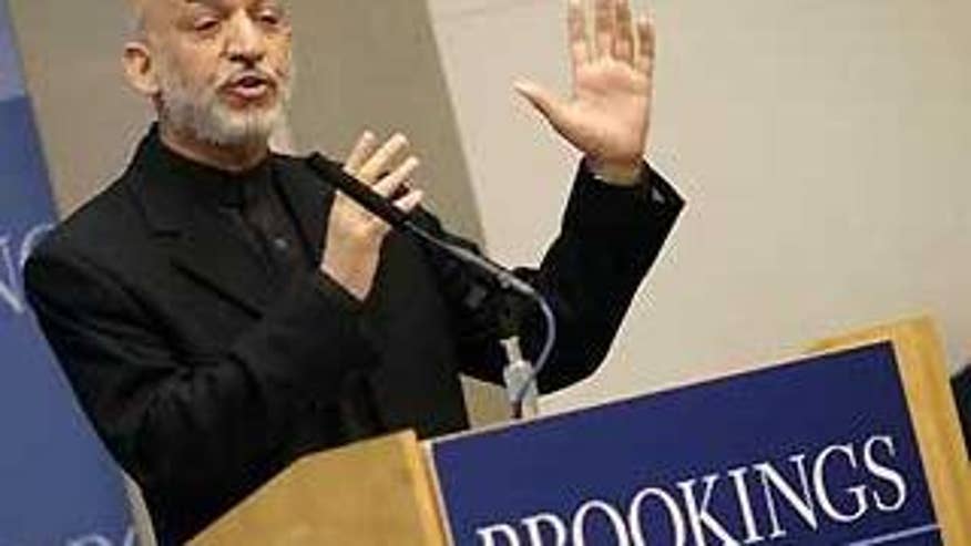 Afghan President Hamid Karzai speaks at the Brookings Institution in Washington Tuesday. (Reuters Photo)
