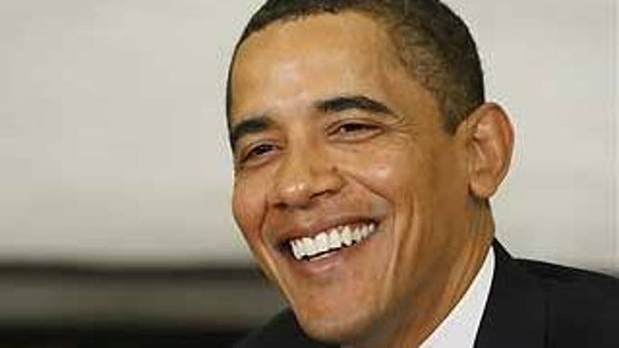 President Obama smiles during a meeting Monday in Washington. (AP Photo)