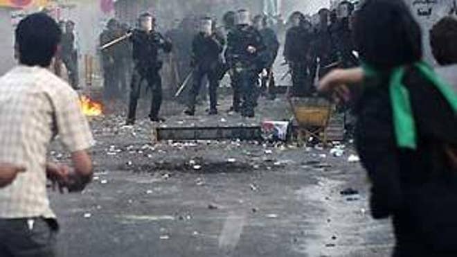 June 20, 2009: Protesters clash with Iranian riot police (AP Photo).