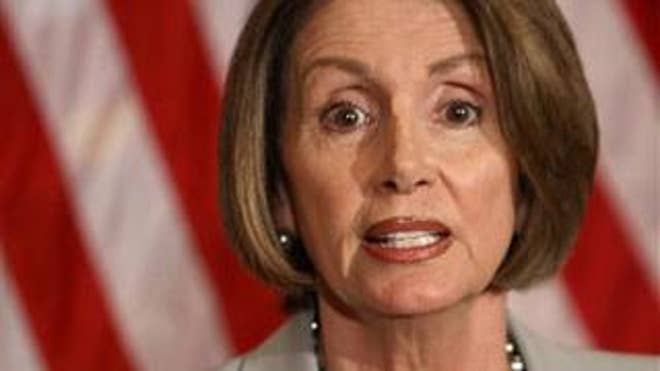 House Speaker Nancy Pelosi speaks with reporters