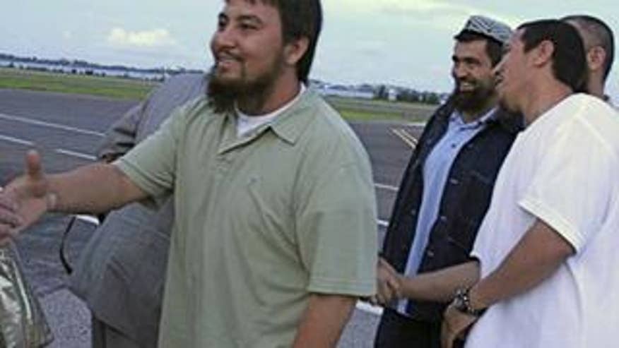 The four Guantanamo Bay detainees, ethnic Uighurs from China, in Bermuda